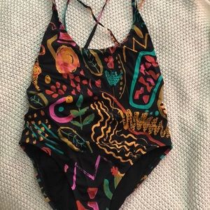 Out from under 1 piece. High leg